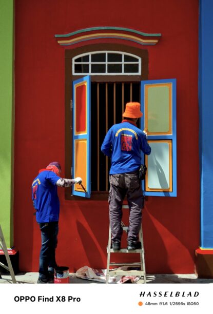 This series is an invitation to step into the vibrant fragments of Little India, a part of Singapore that pulses with colour, sound, and life. Through tight, intimate compositions, I aim to capture the fleeting moments that often go unnoticed—the layers of texture, the play of light, the quiet connections between people and place. Colours are not just a backdrop but an essential part of Little India’s identity, from the vivid yellows and reds that saturate the streets to the soft hues that tell stories of everyday life.